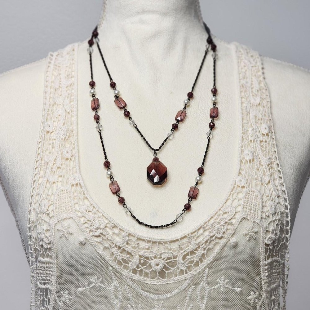 Victorian strand of polished and cut gem like stones.